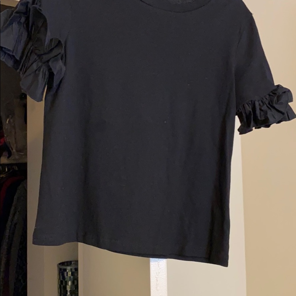 Black top with ruffles